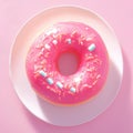 Closeup a charming pink donut with white sprinkles. Royalty Free Stock Photo