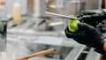 Closeup of a chef zesting a lime in the kitchen Royalty Free Stock Photo