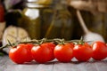 Closeup of cherry tomatoes on a dark wooden background Royalty Free Stock Photo