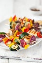 Closeup of chicken skewers or shashlik with grilled vegetables Royalty Free Stock Photo