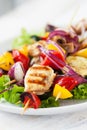 Closeup of chicken skewers or shashlik with grilled vegetables Royalty Free Stock Photo