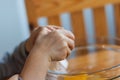 Closeup, of a child breakable egg on the kitchen table in a glass