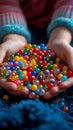 Closeup child hands, playing with sensory balls for development