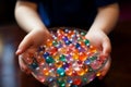 Closeup child hands, playing with sensory balls for development