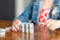 Closeup of child playing with dominoes Royalty Free Stock Photo