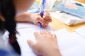 Child doing her homework Royalty Free Stock Photo