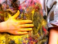 Closeup of children hands painting during a school activity - learning by doing, education and art, art therapy concept Royalty Free Stock Photo