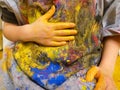 Closeup of children hands painting during a school activity - learning by doing, education and art, art therapy concept Royalty Free Stock Photo