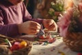 Closeup of a childs hands carefully crafting an