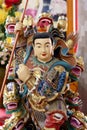 Closeup Chinese god statue.