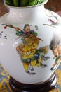 Closeup of the Chinese mountain warrior beautifully painted on the cermaic white vase Royalty Free Stock Photo