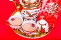 Closeup on Chinese tea set with envelope bearing the word double happiness Royalty Free Stock Photo