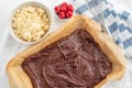 Closeup of chocolate cake with raspberry and streusel Royalty Free Stock Photo
