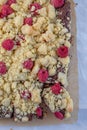 Closeup of chocolate cake with raspberry and streusel Royalty Free Stock Photo