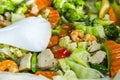 Closeup of Chop Suey with shrimp, broccoli, bell peppers, carrots, string beans and chicken bits