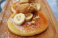 Chopped nuts with sliced bananas, healthy toppings of pancaked