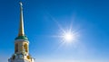 Christian church roof on blue sky background in light of sparkle sun Royalty Free Stock Photo