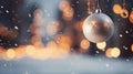 Closeup of Christmas bauble ball decoration on Christmas tree with golden bokeh festive lights background. Merry Christmas and Royalty Free Stock Photo