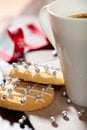 Closeup of christmas biscuits and a mug of coffee