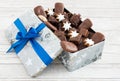 Closeup of a Christmas Cookie Tin filled with a Variety of Gingerbreads Royalty Free Stock Photo