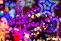 Christmas holiday festive glittering defocused colorful background with bokeh lights Royalty Free Stock Photo