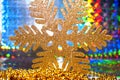 Closeup of a christmas snowflake on colorful abstract background Royalty Free Stock Photo