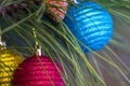 Closeup christmas toys on pine tree branch