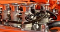 Hot Rod Headers Closeup in Orange Classic Car Royalty Free Stock Photo