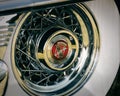 Closeup of a chrome wheel of a Cadillac with a logo on it in Sunne, Sweden