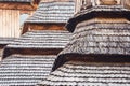 Closeup church pitched roof made of wood shingle