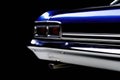 Closeup of a classic navy blue drag racing car with chrome rims and silver details. Speed drive concept. AI generation