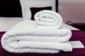 Closeup clean towels and soap in hotel room hygiene and hospitality concept Royalty Free Stock Photo