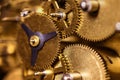 Closeup from a clockwork machinery, brassy gears Royalty Free Stock Photo