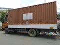 Closeup of closed Long Container or Truck Parking on Road Side