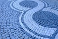 Closeup of a cobbled street. Grey paving stones. Cobblestones. Pavers. Space for text Royalty Free Stock Photo