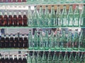 Closeup of Coca Cola glass bottles in store