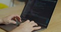 Closeup coding on screen, Man hands coding html and programming on screen laptop, development web, developer. Royalty Free Stock Photo