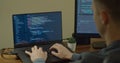Closeup coding on screen, Man hands coding html and programming on screen Monitors, development web, developer. Royalty Free Stock Photo