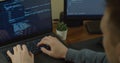 Closeup coding on screen, Man hands coding html and programming on screen Monitors, development web, developer. Royalty Free Stock Photo