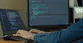 Closeup coding on screen, Man hands coding html and programming on screen Monitors, development web, developer. Royalty Free Stock Photo