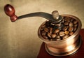 Closeup coffee bean and coffee grinder Royalty Free Stock Photo