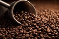 Closeup of coffee beans with scoop in mood lighting