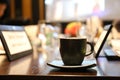 Closeup of coffee cup in conference room. Royalty Free Stock Photo