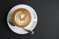 Closeup coffee latte art cup on table Royalty Free Stock Photo