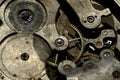 Closeup of cogweels in clockwork, grunge steampunk background Royalty Free Stock Photo