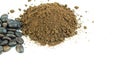 Closeup collected coffee beans with coffee powder on white Royalty Free Stock Photo