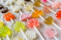 closeup of a collection of miniature lollipops in various shapes Royalty Free Stock Photo
