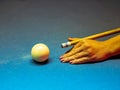 Closeup of colorful billiard balls on blue pool table in daylight Royalty Free Stock Photo