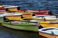 Closeup of colorful boats on the Taedong river waiting for passengers in the blue background Royalty Free Stock Photo