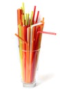 Closeup of Colorful drinking straws background, tubes for cocktails on a white background